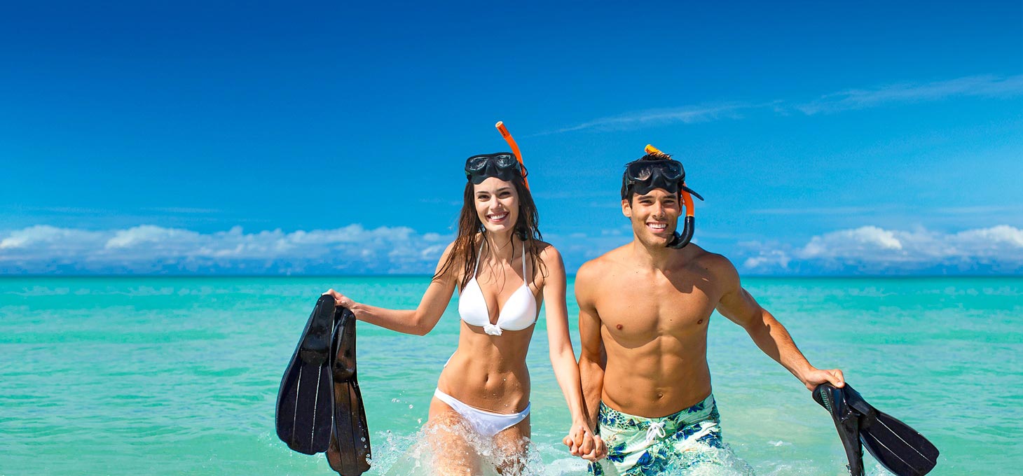 Couple with diving accessories