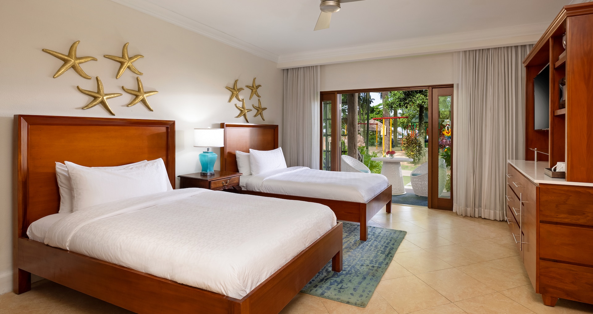 Negril Resort & Spa - Tropical Oceanview Three-Bedroom Walkout Grand Butler Family Suite