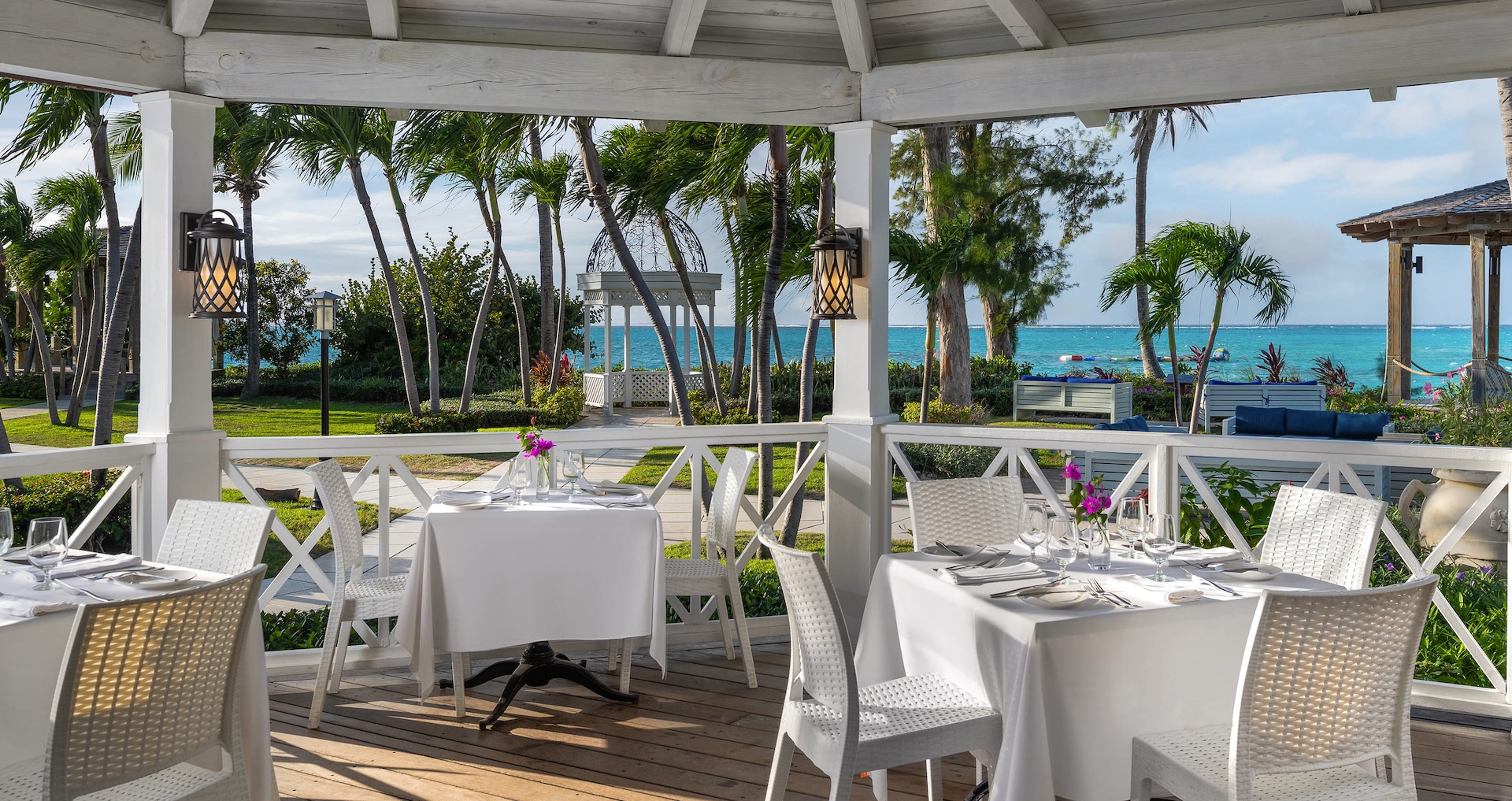 Official supplier image of an oceanfront dining terrace at Beaches Turks and Caicos