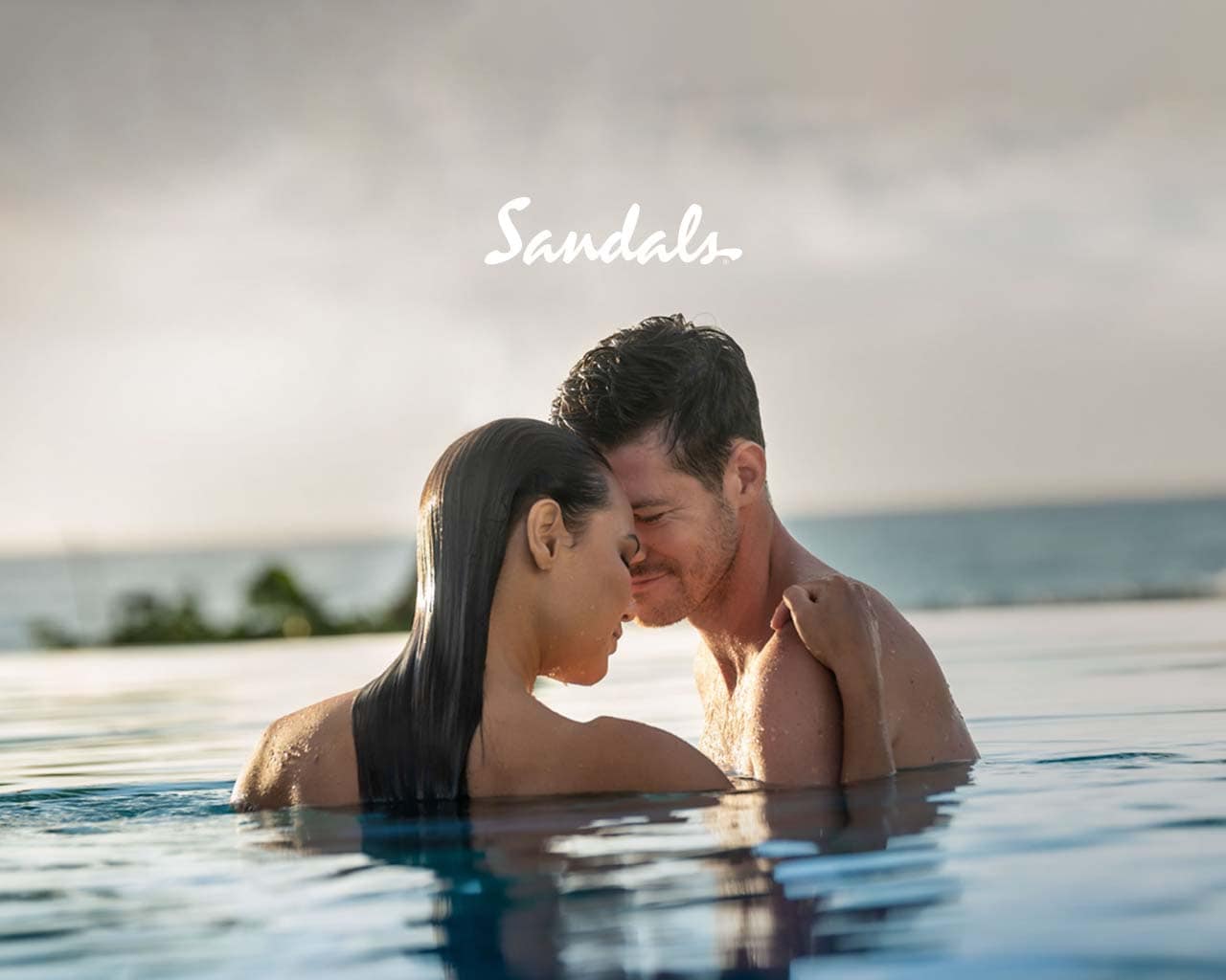 Tropical Caribbean beach representing Sandals Resorts destinations