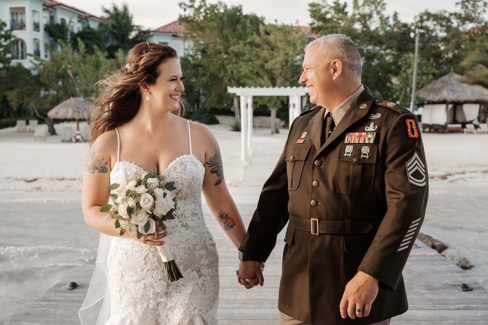bride_groom_holding_hands_outside_olga_sam