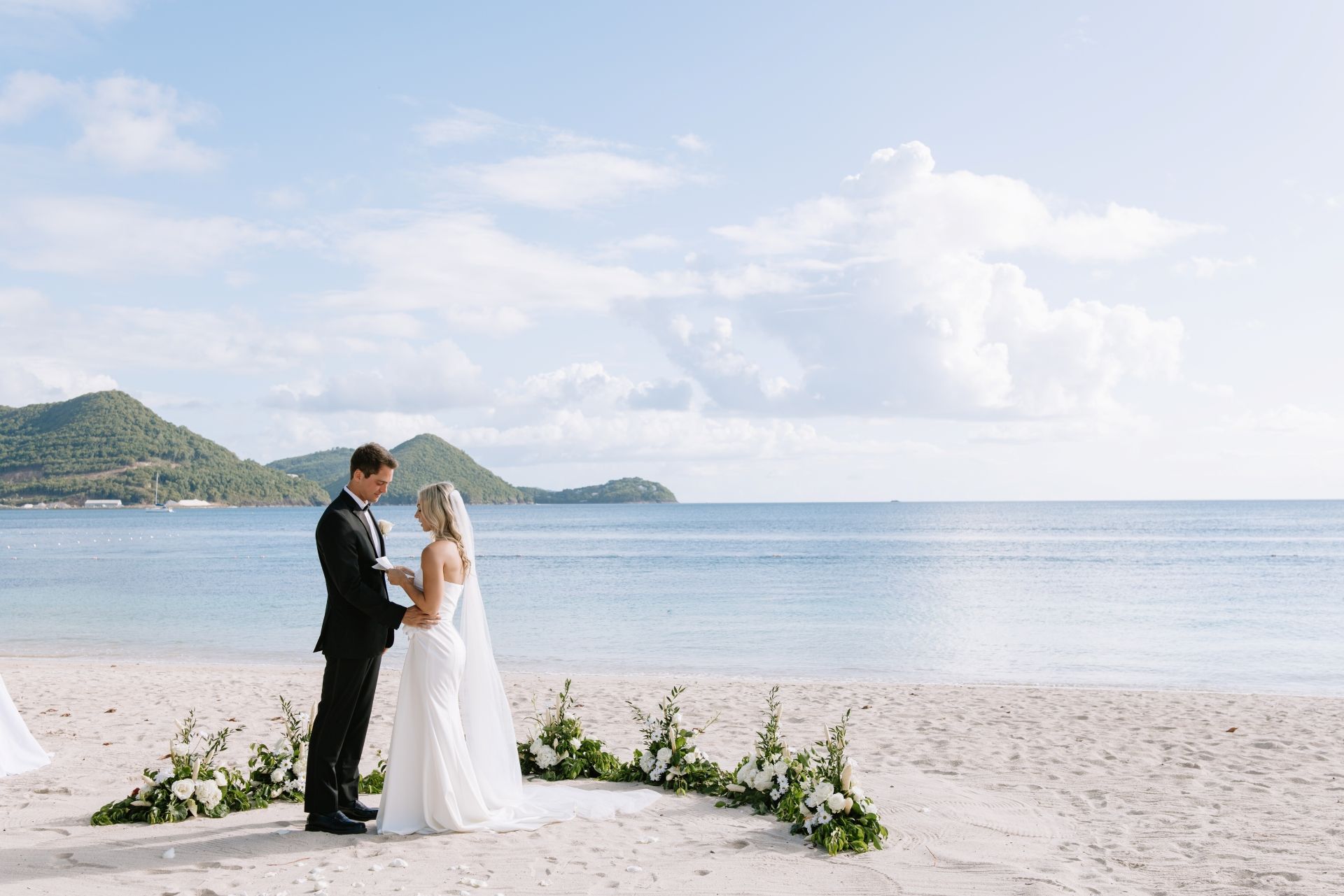 beach wedding ceremony in St. Lucia with ocean and mountain views