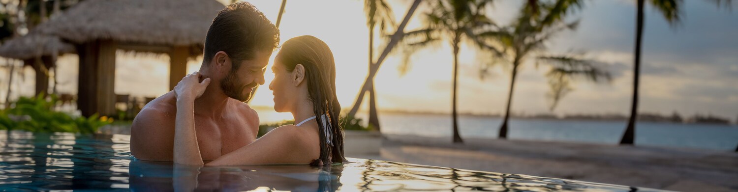 Couple relaxing in hammock