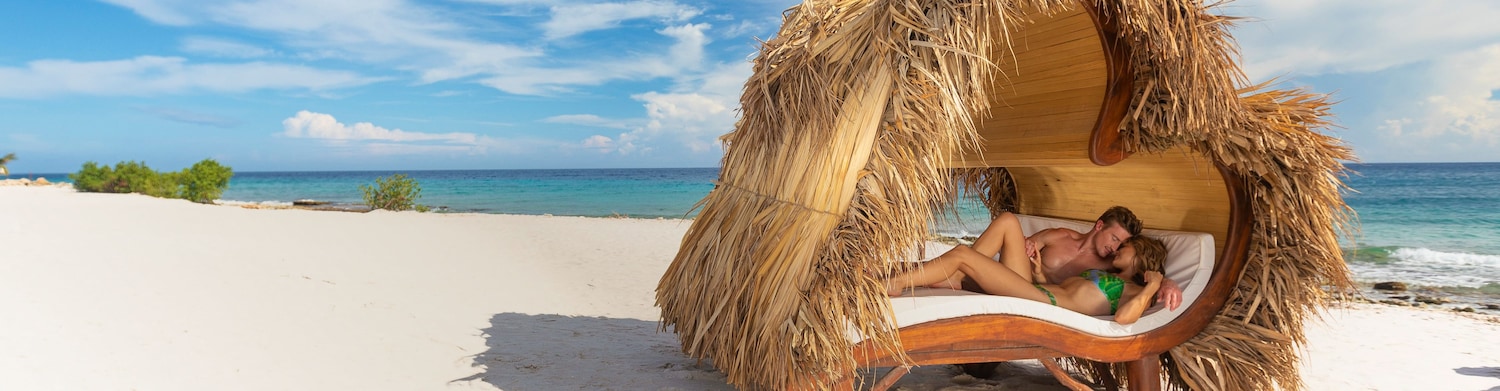 Couple relaxing in beach chair