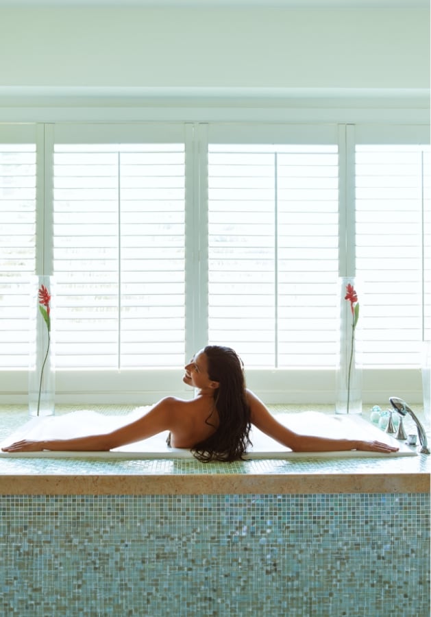 Woman on bath tub