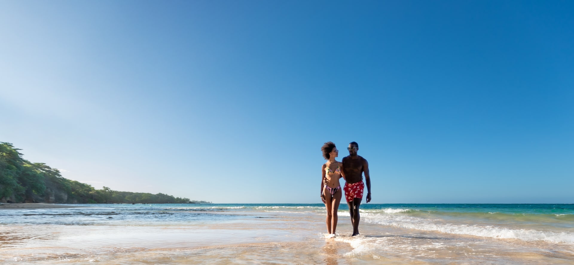 Couple walking on the beach