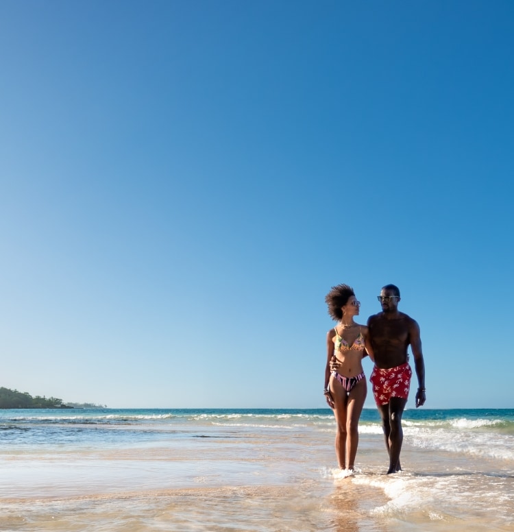 Couple walking on the beach