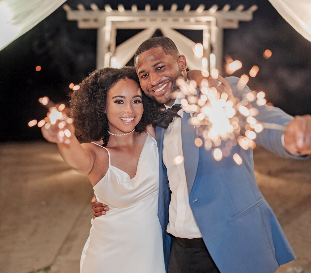 Couple cutting cake