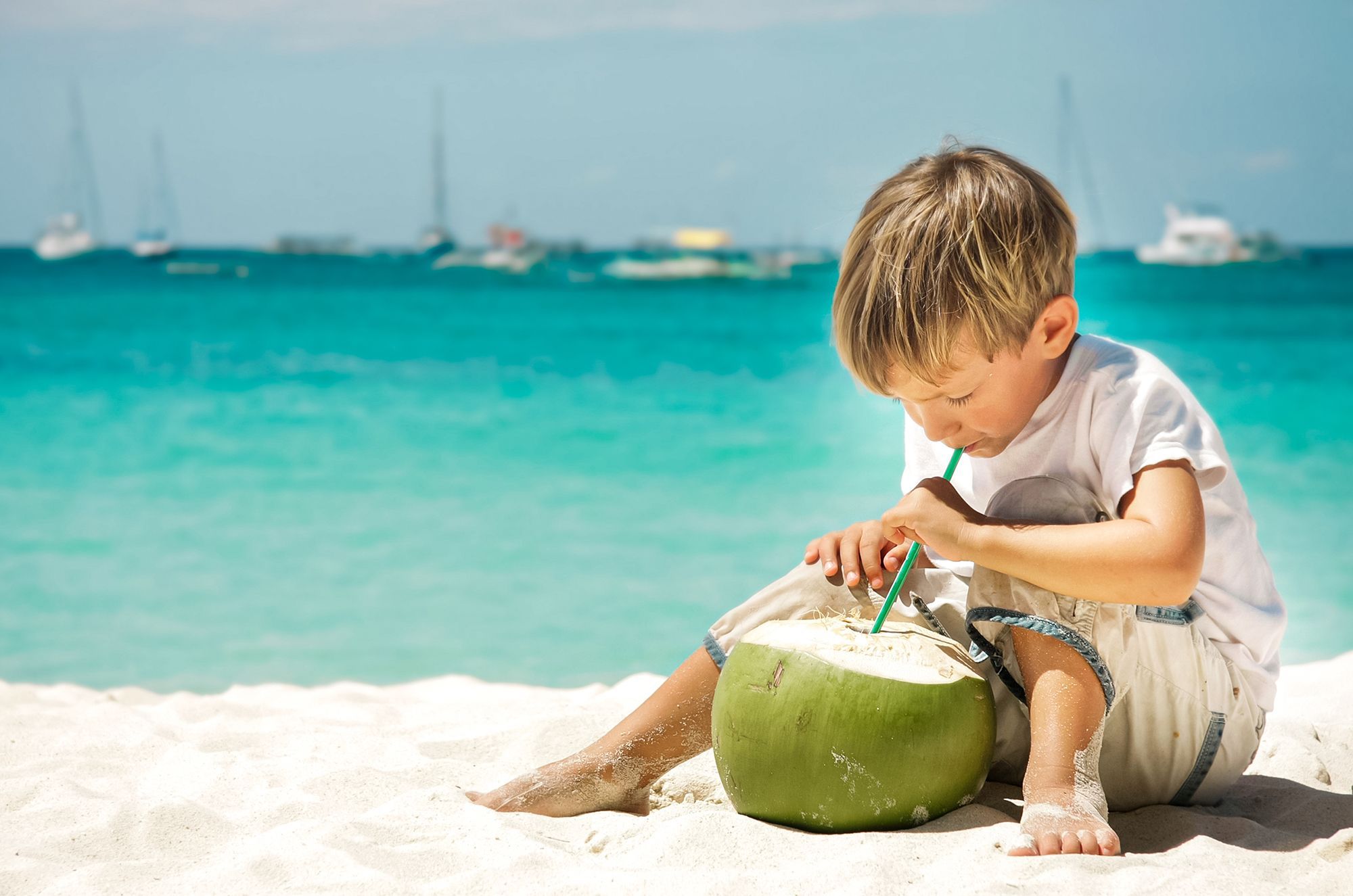 Turks-Caicos-Young-Boy-Coconut-Beach-1-.jpg