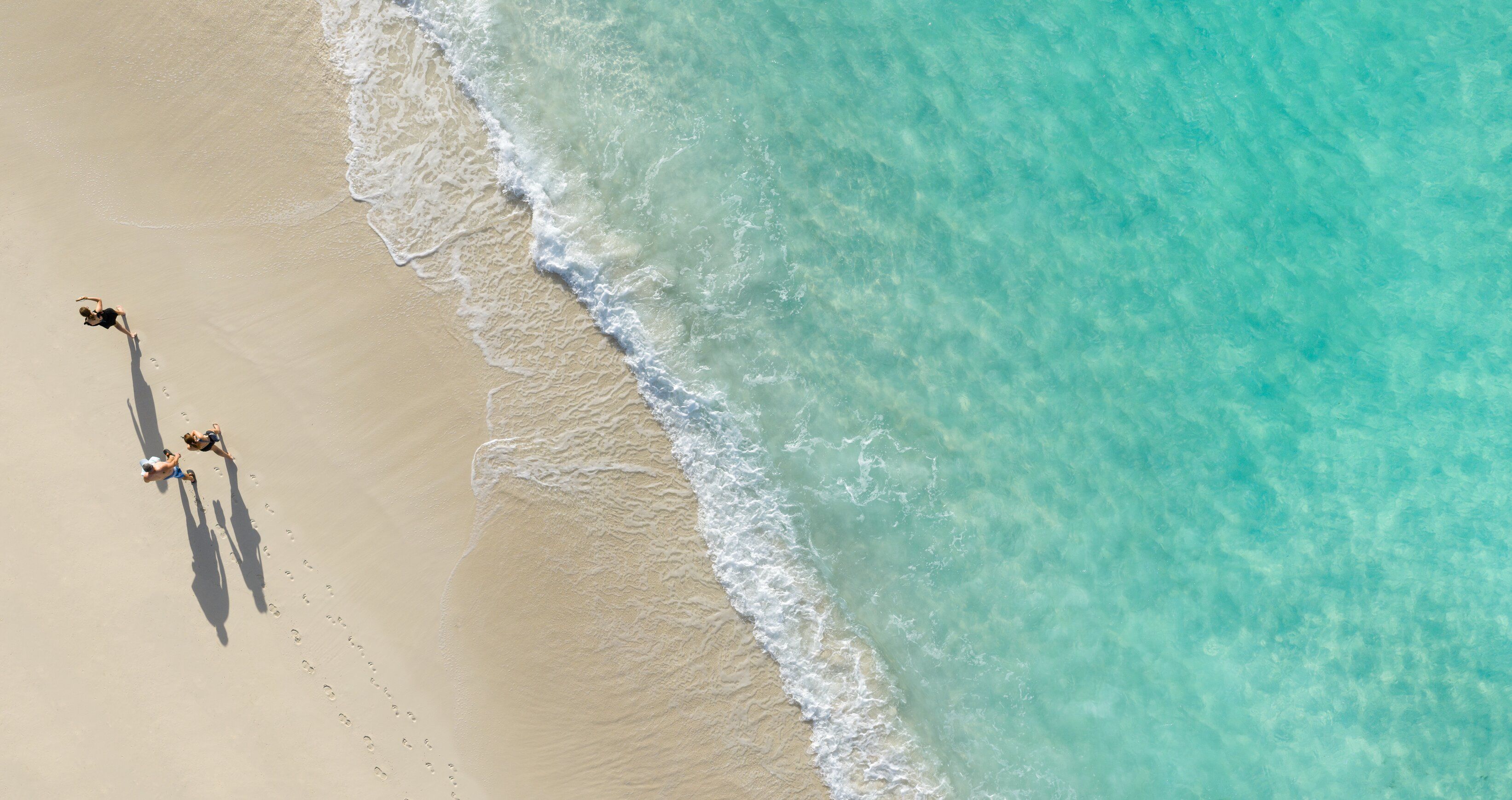 Web Version-BTC-Beach-Three-People-Birdseye.jpg