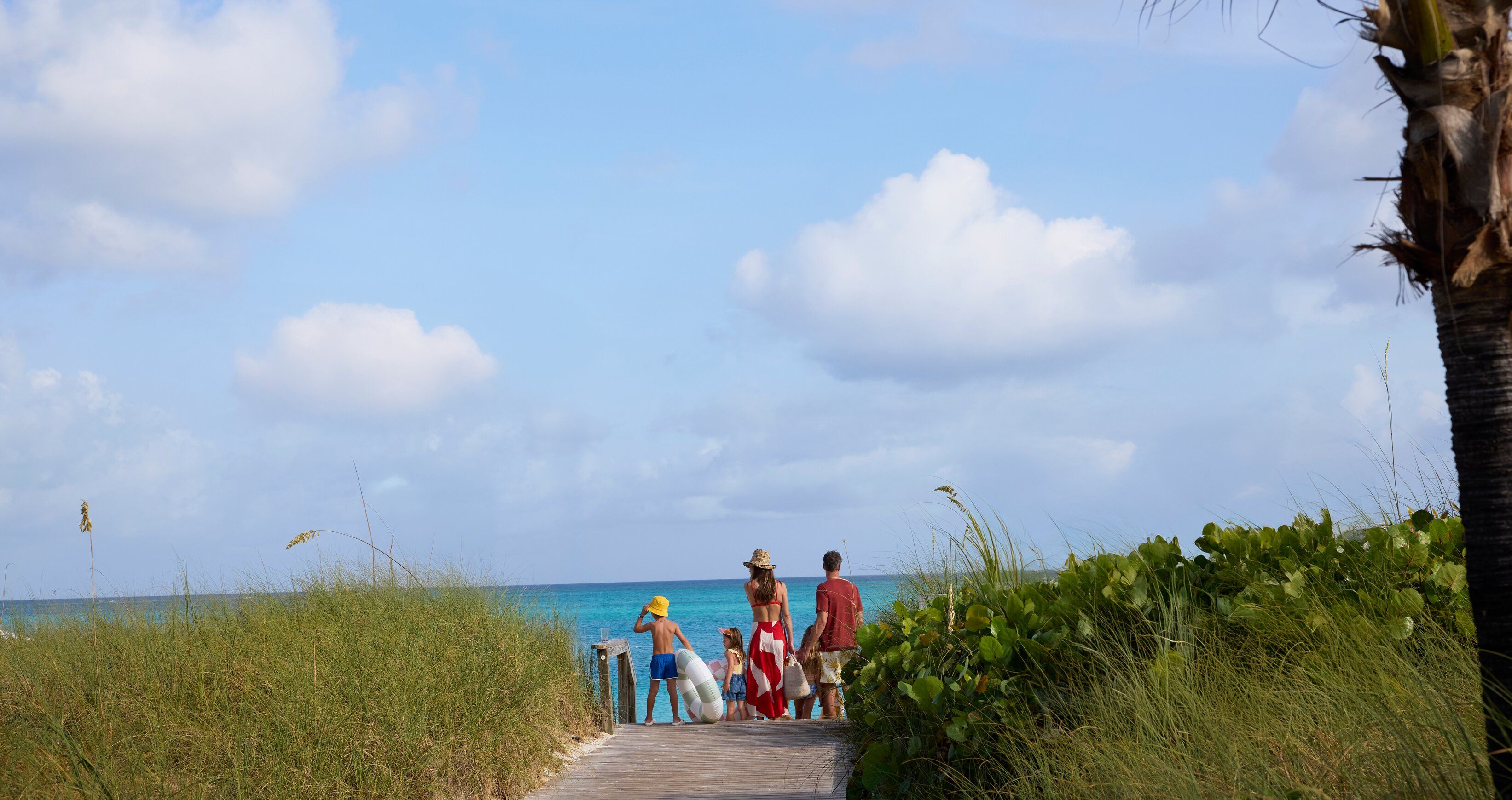 Web Version-BTC-Lifestyle-Family-Boardwalk-Beach.jpg