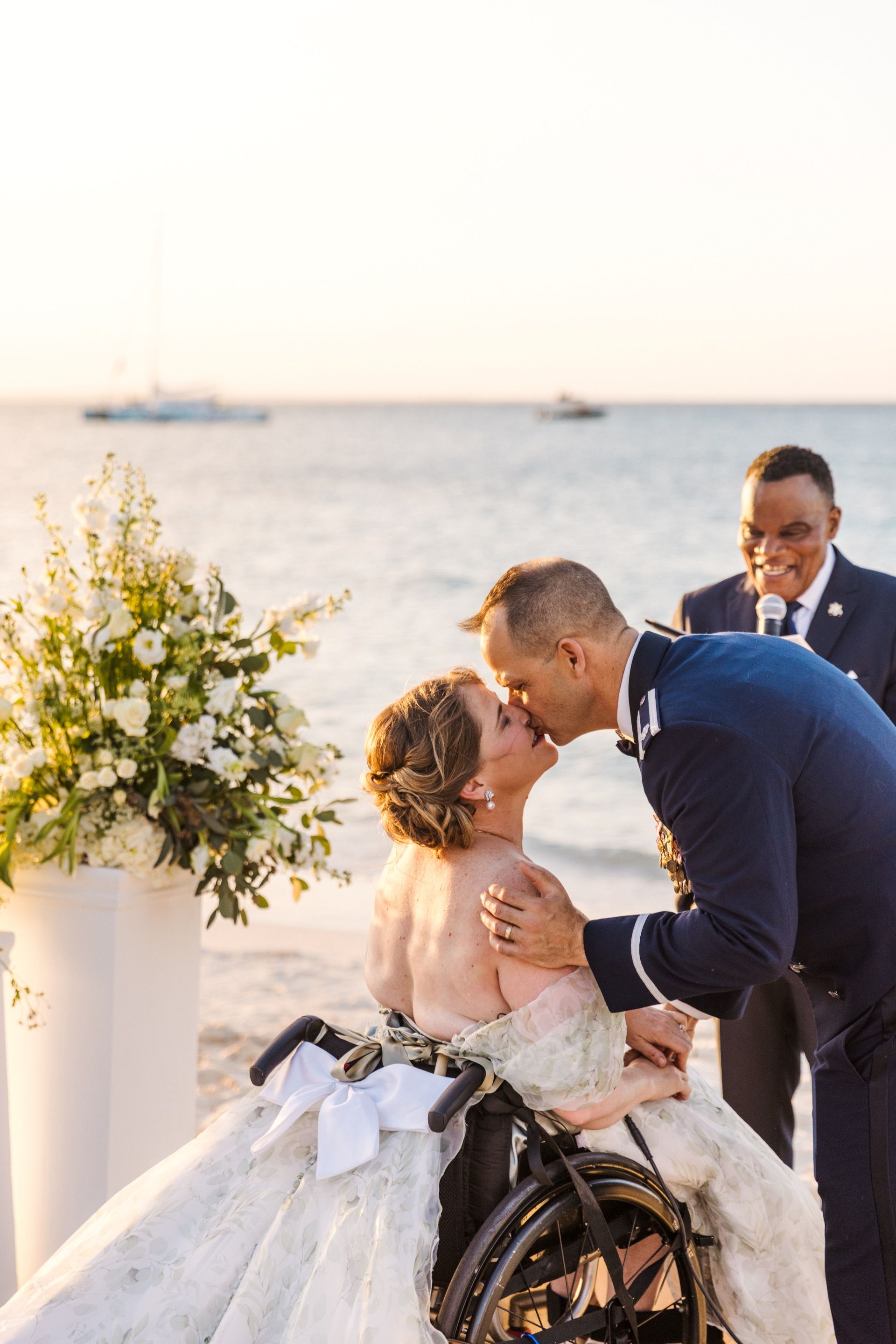kristy-and-ryan-share-a-kiss-beach-vow-renewal.jpg