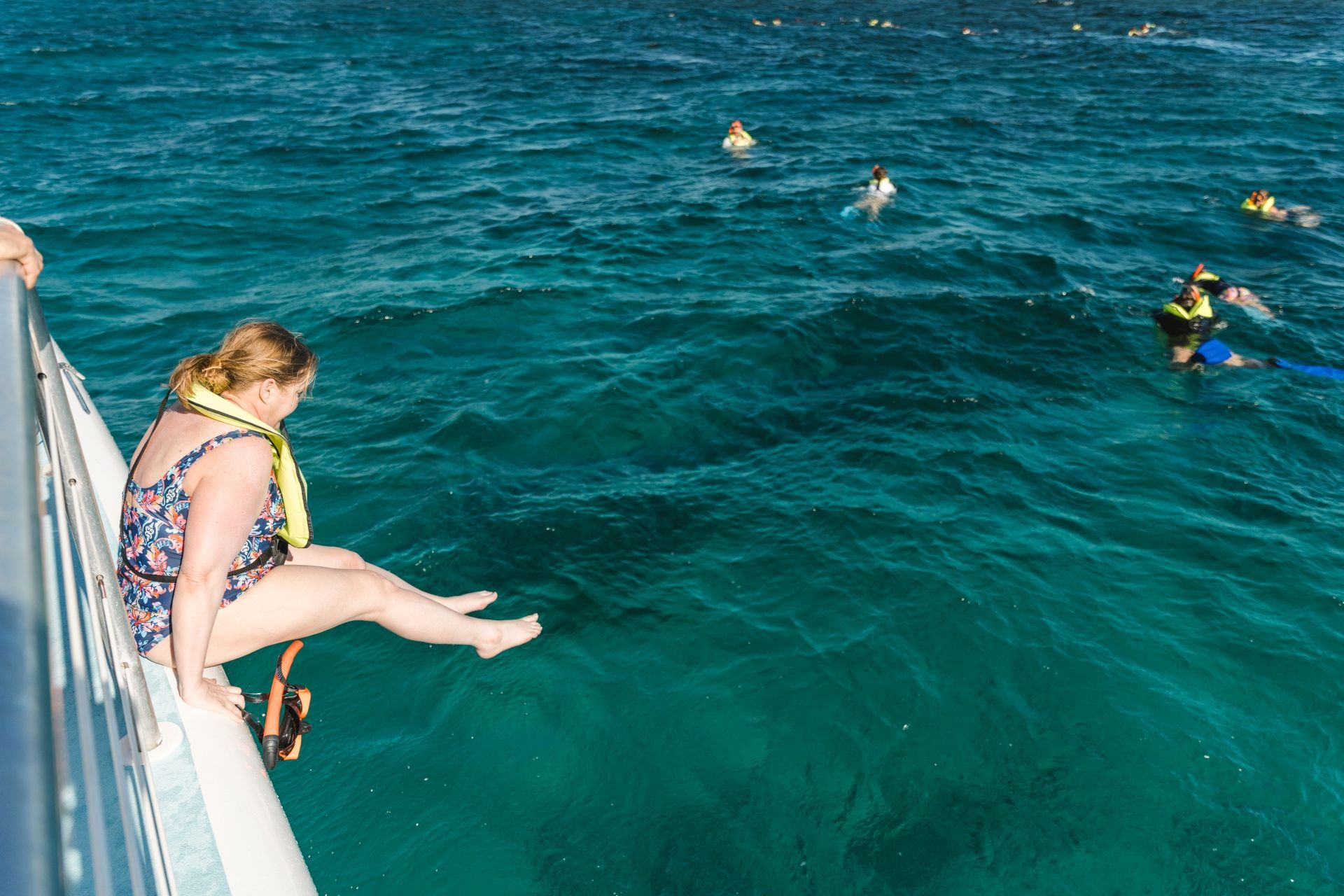 kristy-diving-into-caribbean-sea-during-snorkeling-excursion.jpg